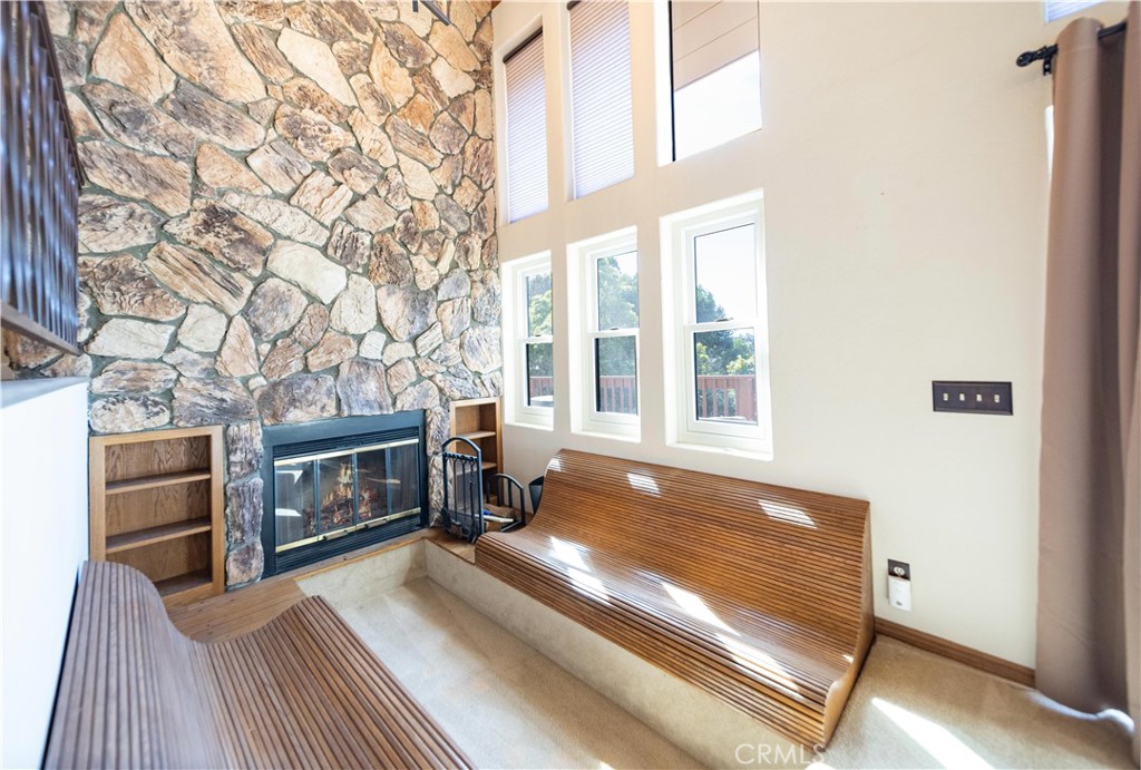 2248 Mil Sorpresas Drive Fallbrook, CA 92028 - Photo 60 of 74 a view of a livingroom with furniture and a fireplace