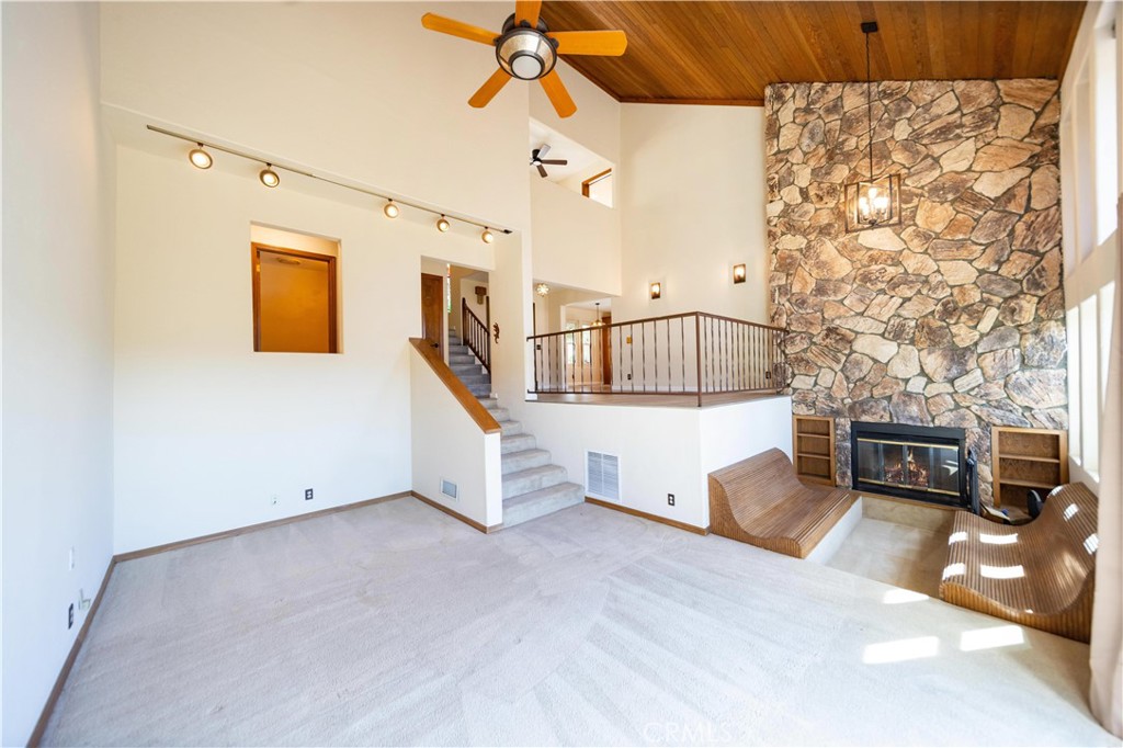 2248 Mil Sorpresas Drive Fallbrook, CA 92028 - Photo 61 of 74 a view of a livingroom with furniture and a flat screen tv