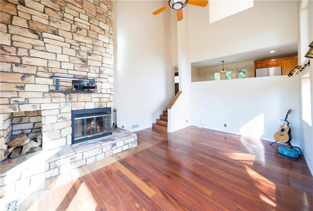 2248 Mil Sorpresas Drive Fallbrook, CA 92028 - Photo 63 of 74 a living room with furniture and a fireplace
