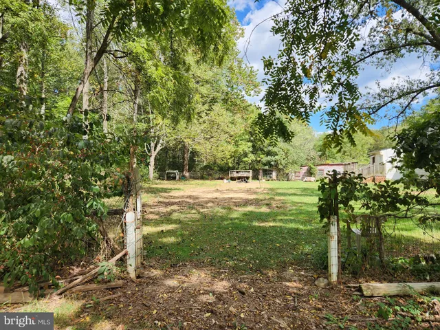 a view of outdoor space and yard