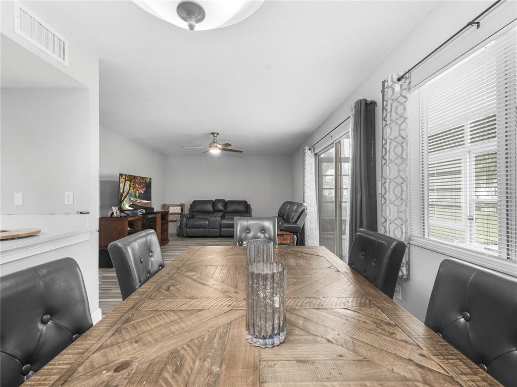 622 Fairways Circle, Unit A Ocala, FL 34472 - Photo 11 of 26 a living room with furniture and a fireplace