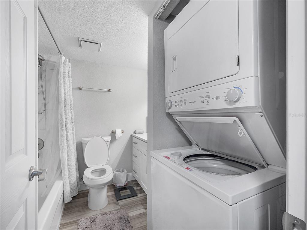 622 Fairways Circle, Unit A Ocala, FL 34472 - Photo 16 of 26 a white toilet sitting next to a bathroom sink