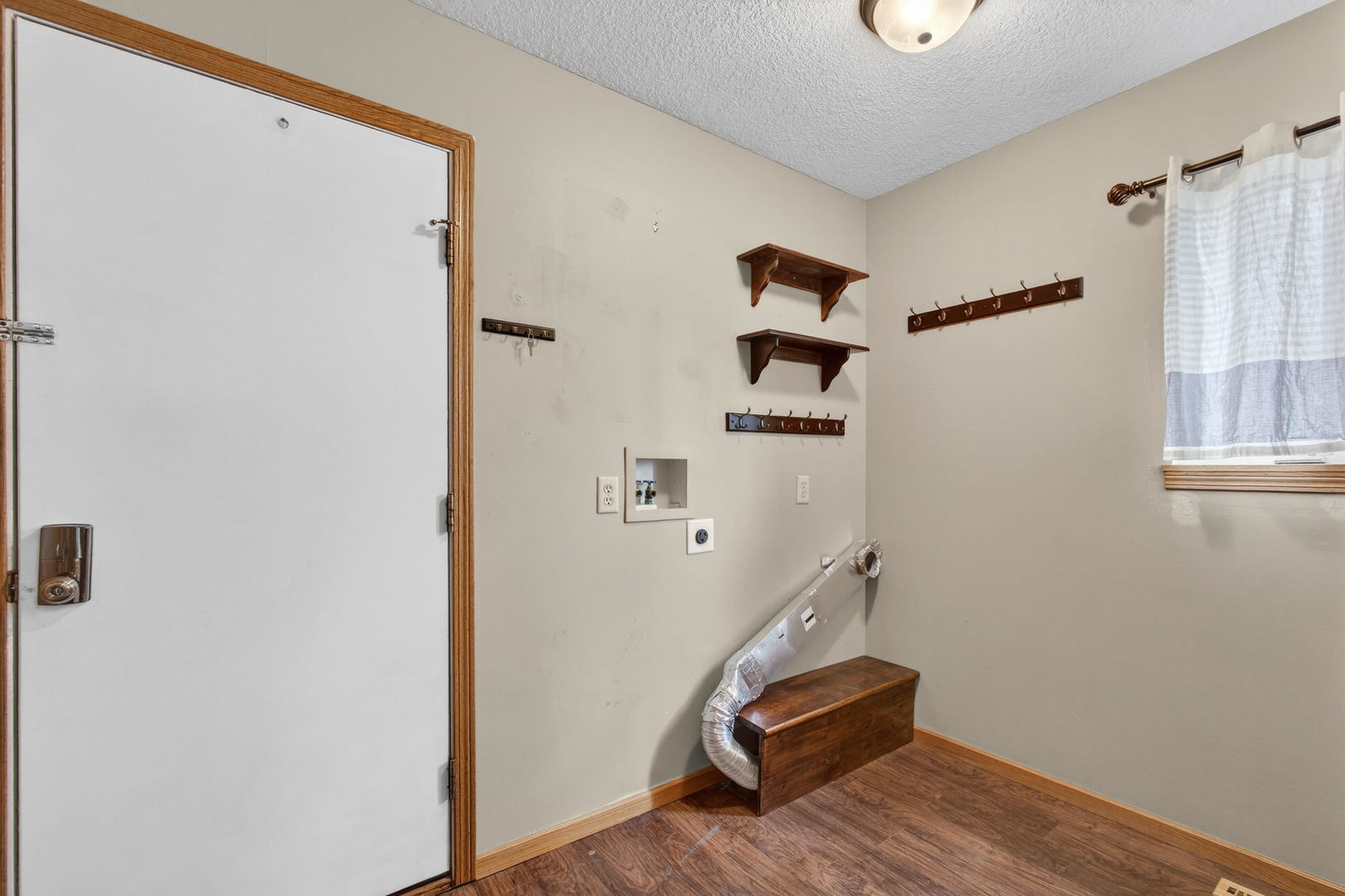 313 Sullivan Drive Colona, IL 61241 - Photo 14 of 41 a view of room with stairs and wooden floor