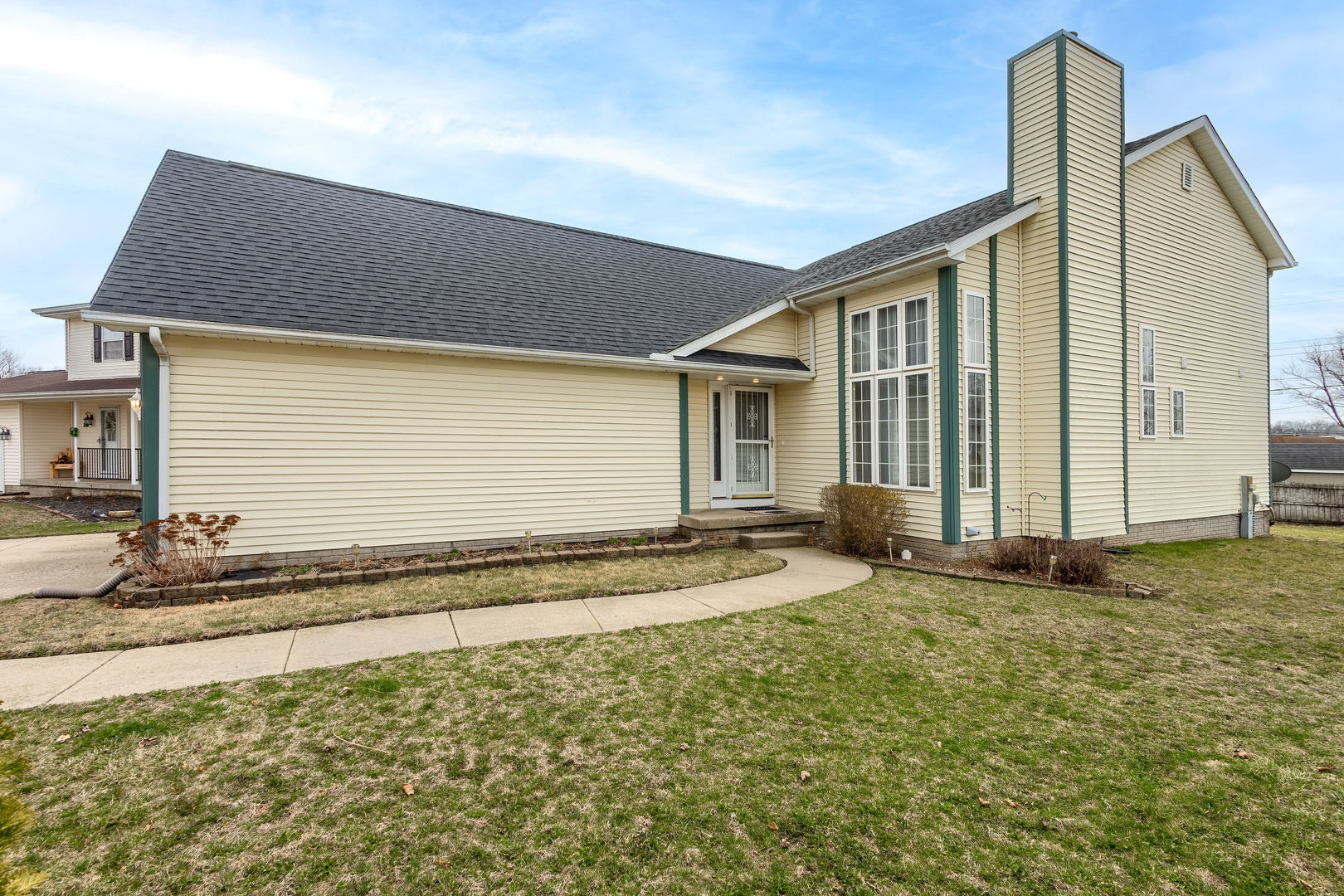 313 Sullivan Drive Colona, IL 61241 - Photo 2 of 41 a view of a house with a yard