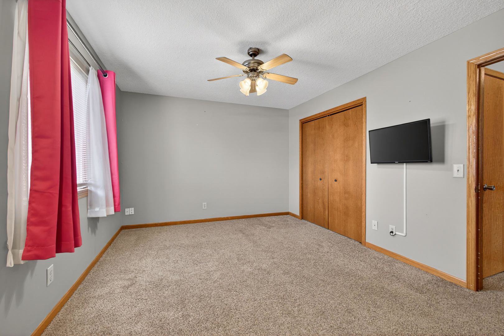313 Sullivan Drive Colona, IL 61241 - Photo 27 of 41 a view of a room with a projector and a fan