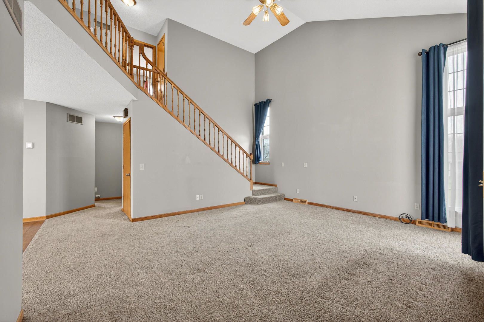 313 Sullivan Drive Colona, IL 61241 - Photo 3 of 41 a view of an empty room with stairs
