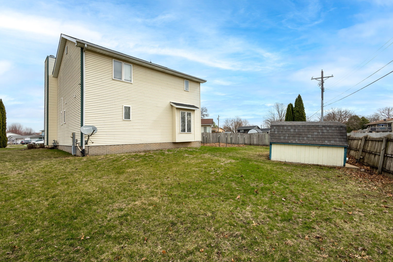 313 Sullivan Drive Colona, IL 61241 - Photo 38 of 41 a view of a house with a backyard
