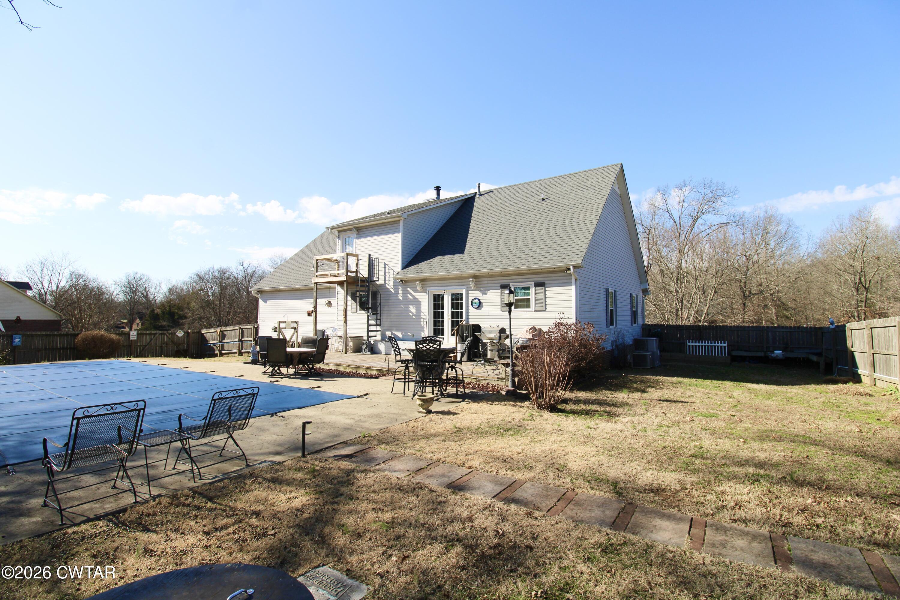285 Meadowbrook Circle Lexington, TN 38351 - Photo 21 of 26 a view of a house with yard and sitting area