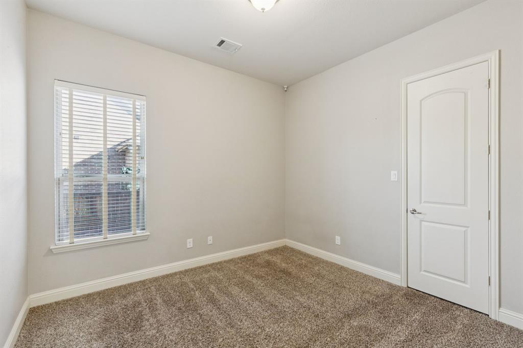 10234 Cava Road Frisco, TX 75035 - Photo 22 of 40 an empty room with windows