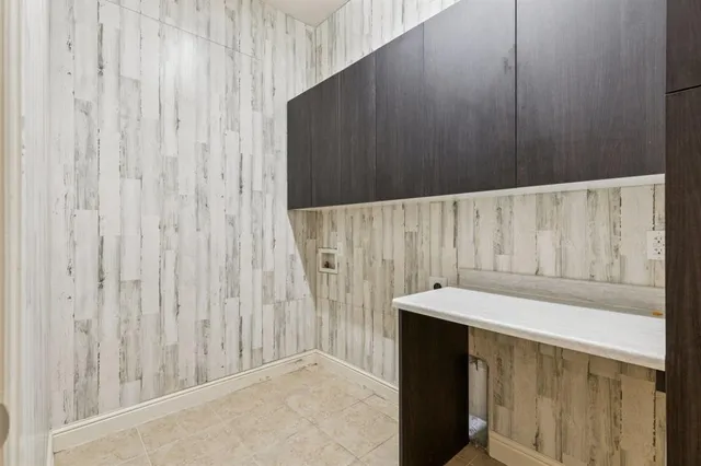 a view of a utility room with a sink