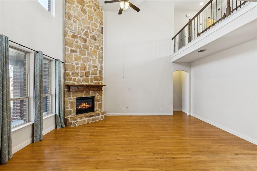 10234 Cava Road Frisco, TX 75035 - Photo 8 of 40 a view of an empty room with window and fire place