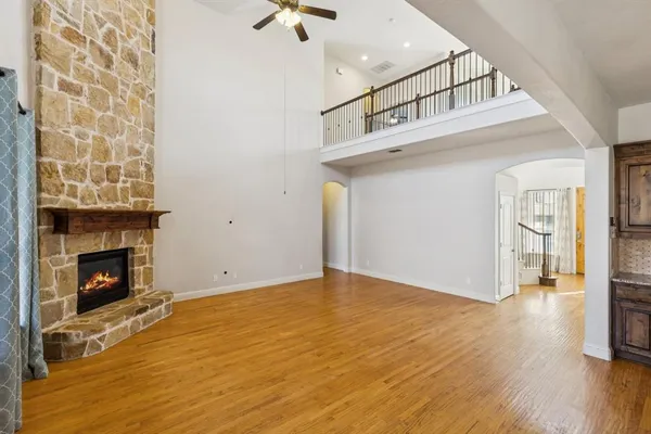 a kitchen with granite countertop a sink a counter top space and stainless steel appliances