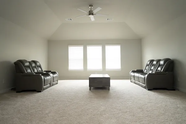 a bedroom with a bed and furniture