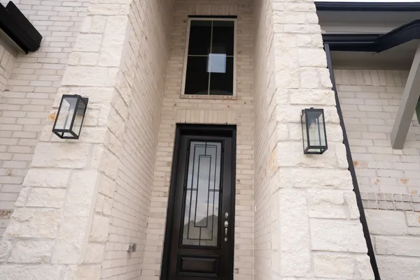 a room with a window and gym equipment