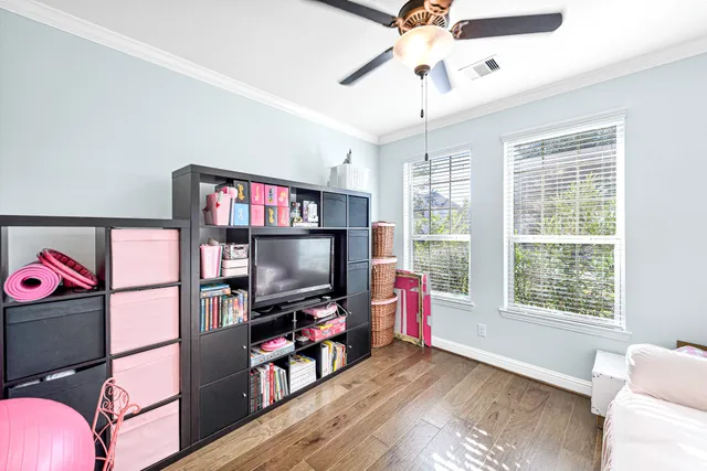 a kitchen with a stove a sink and a refrigerator