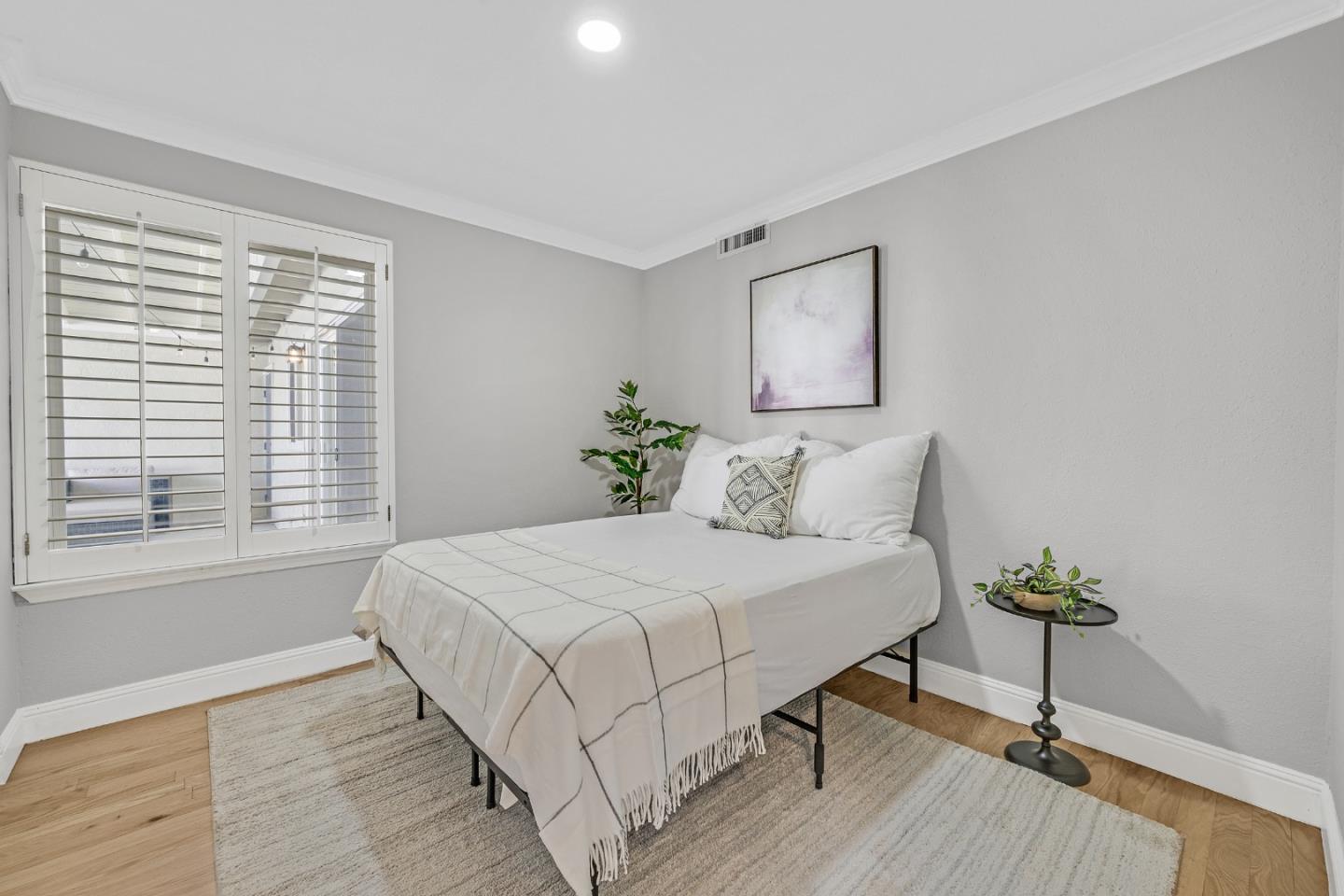 2514 Heatherlark Circle Pleasanton, CA 94566 - Photo 15 of 40 a large white bed sitting in a bedroom next to a window