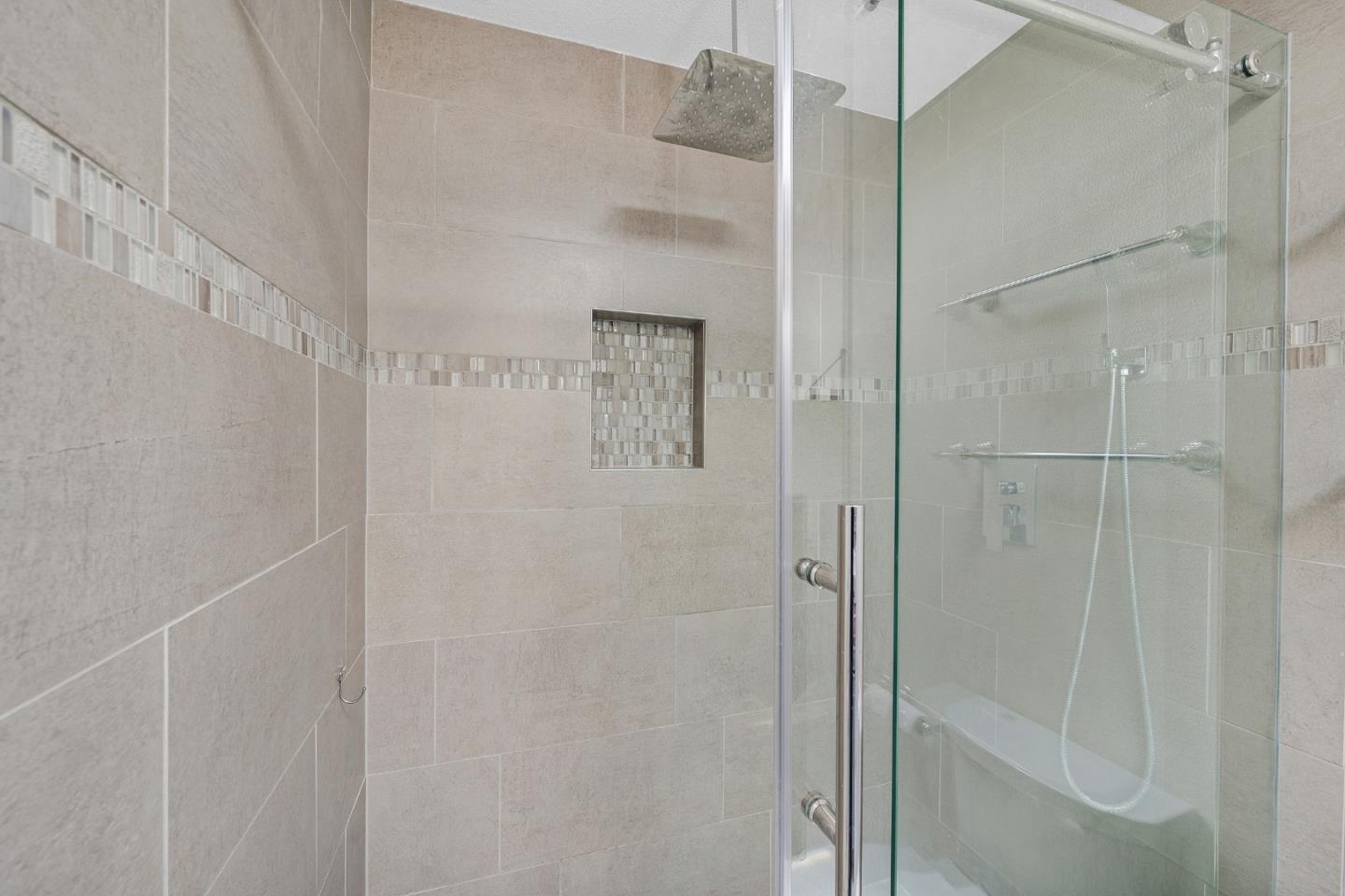 2514 Heatherlark Circle Pleasanton, CA 94566 - Photo 19 of 40 a bathroom with a glass shower door