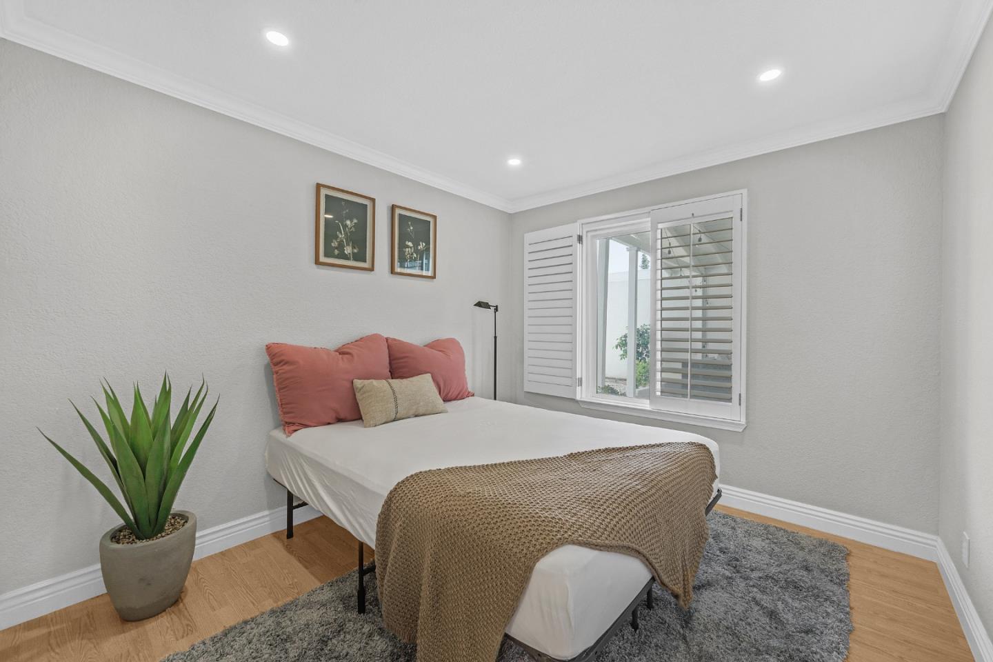 2514 Heatherlark Circle Pleasanton, CA 94566 - Photo 20 of 40 a bedroom with a bed and a potted plant
