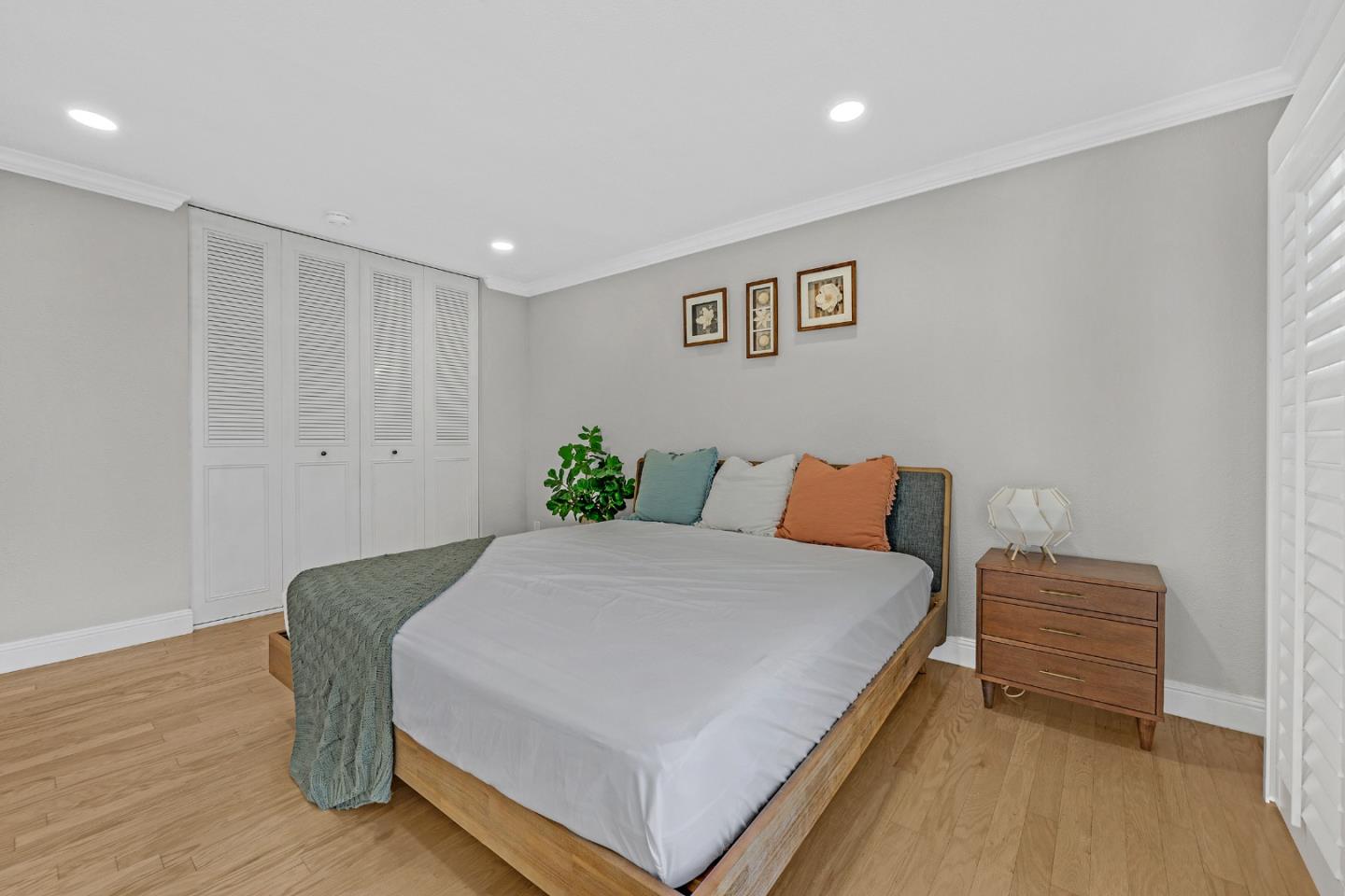 2514 Heatherlark Circle Pleasanton, CA 94566 - Photo 23 of 40 a large white bed sitting in a room next to a cabinet