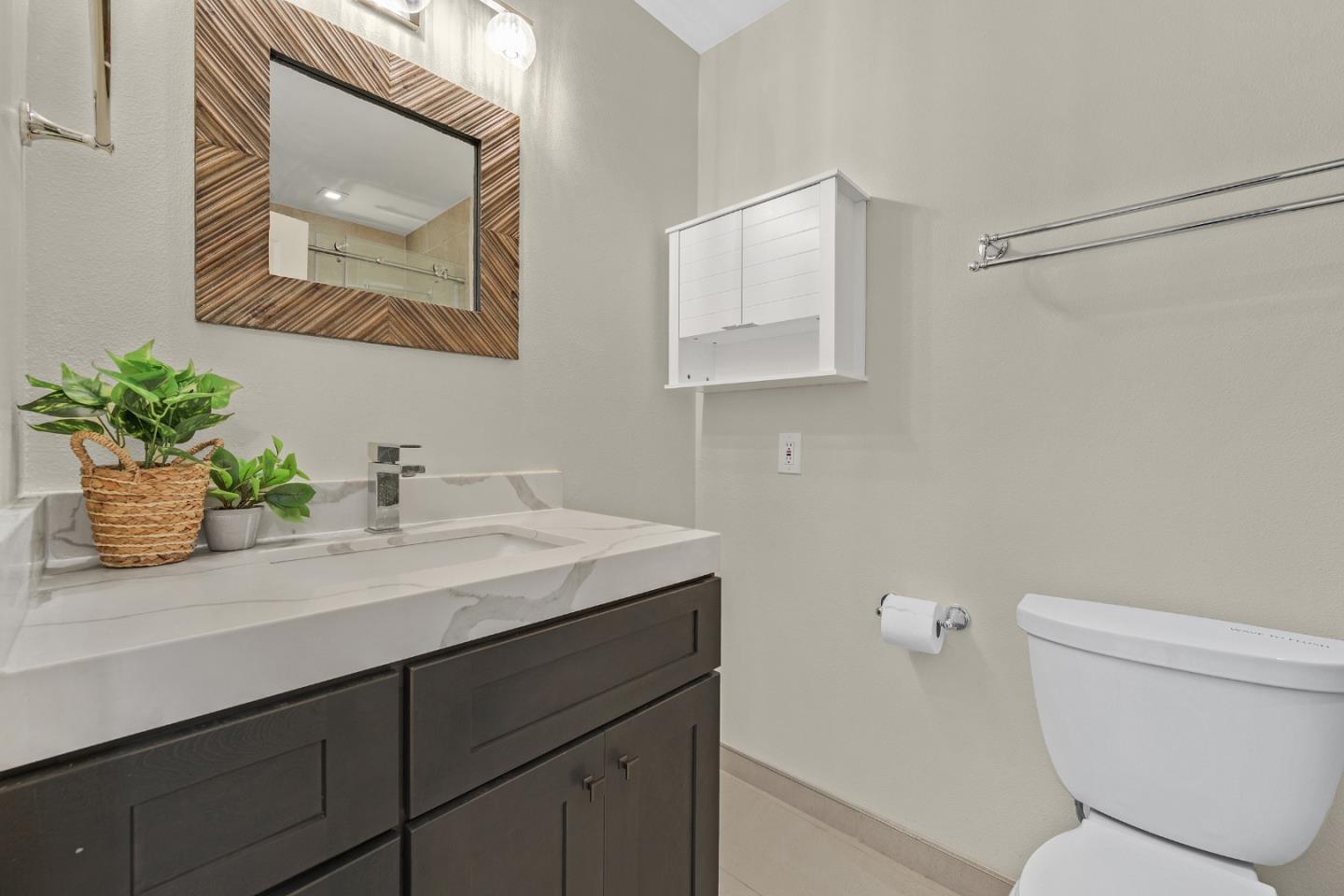 2514 Heatherlark Circle Pleasanton, CA 94566 - Photo 26 of 40 a bathroom with a toilet sink and mirror