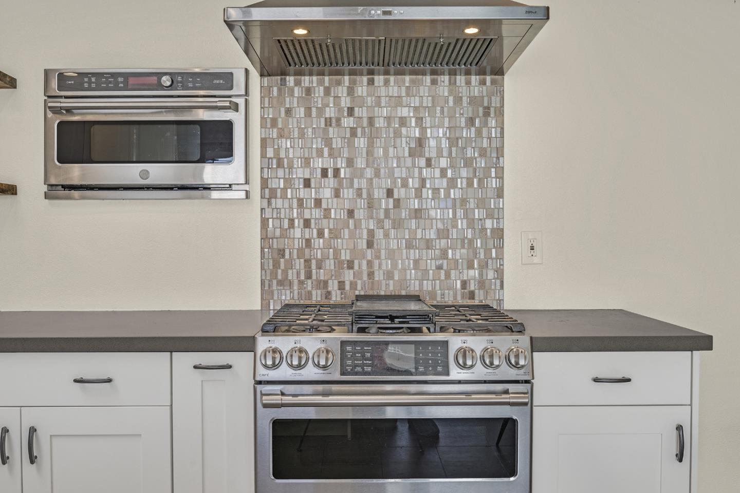 2514 Heatherlark Circle Pleasanton, CA 94566 - Photo 7 of 40 a stove top oven sitting inside of a kitchen