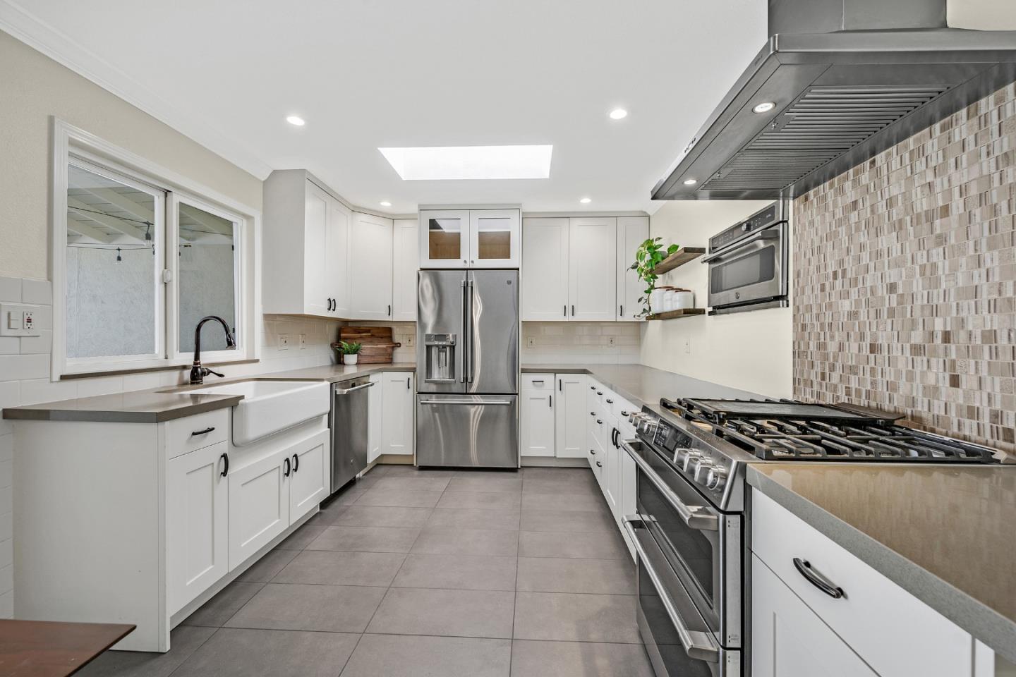 2514 Heatherlark Circle Pleasanton, CA 94566 - Photo 10 of 40 a kitchen with stainless steel appliances a sink stove and cabinets