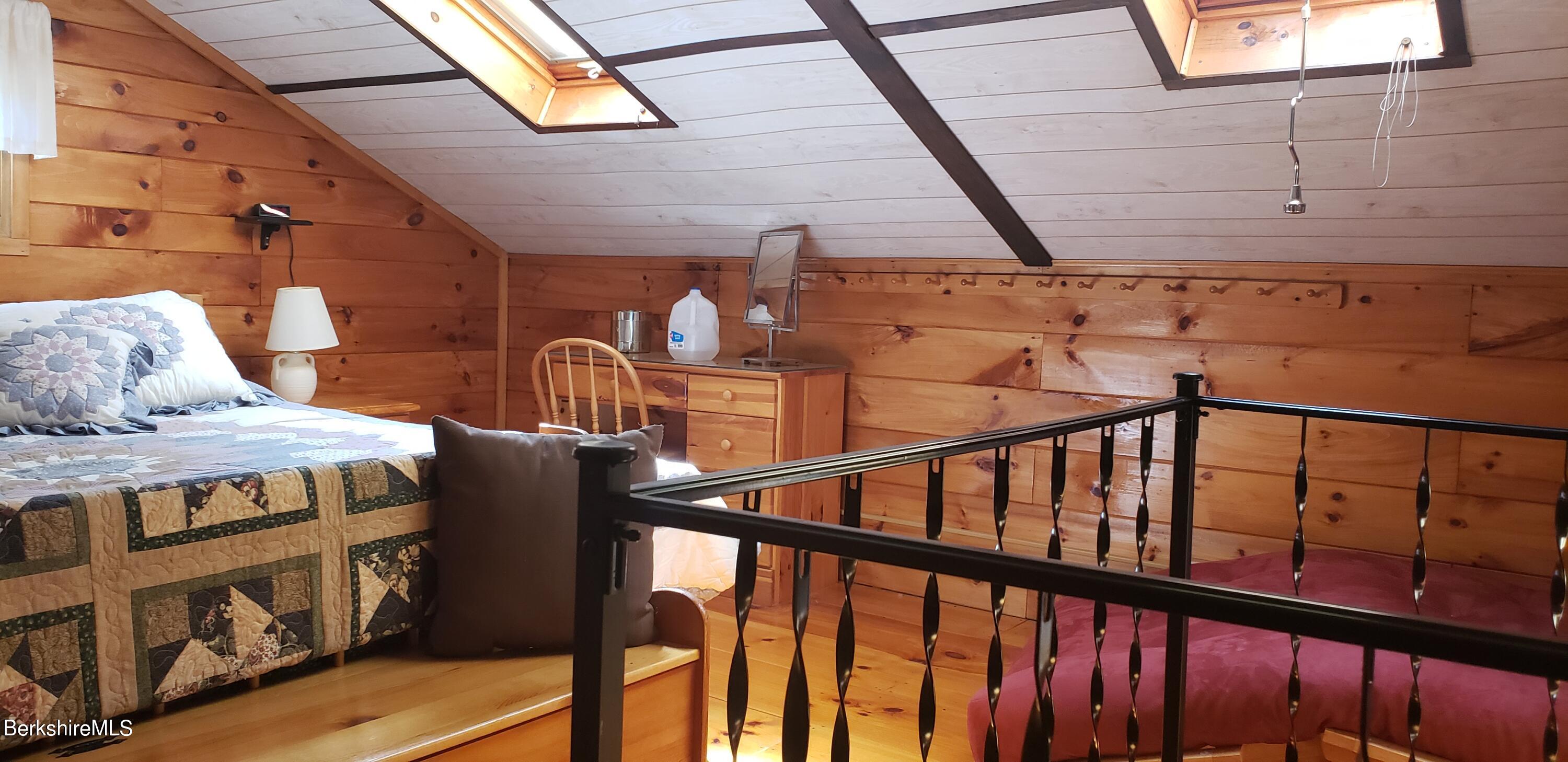 110 Strykers Road Florida, MA 01247 - Photo 19 of 20 a bedroom with furniture and baby crib