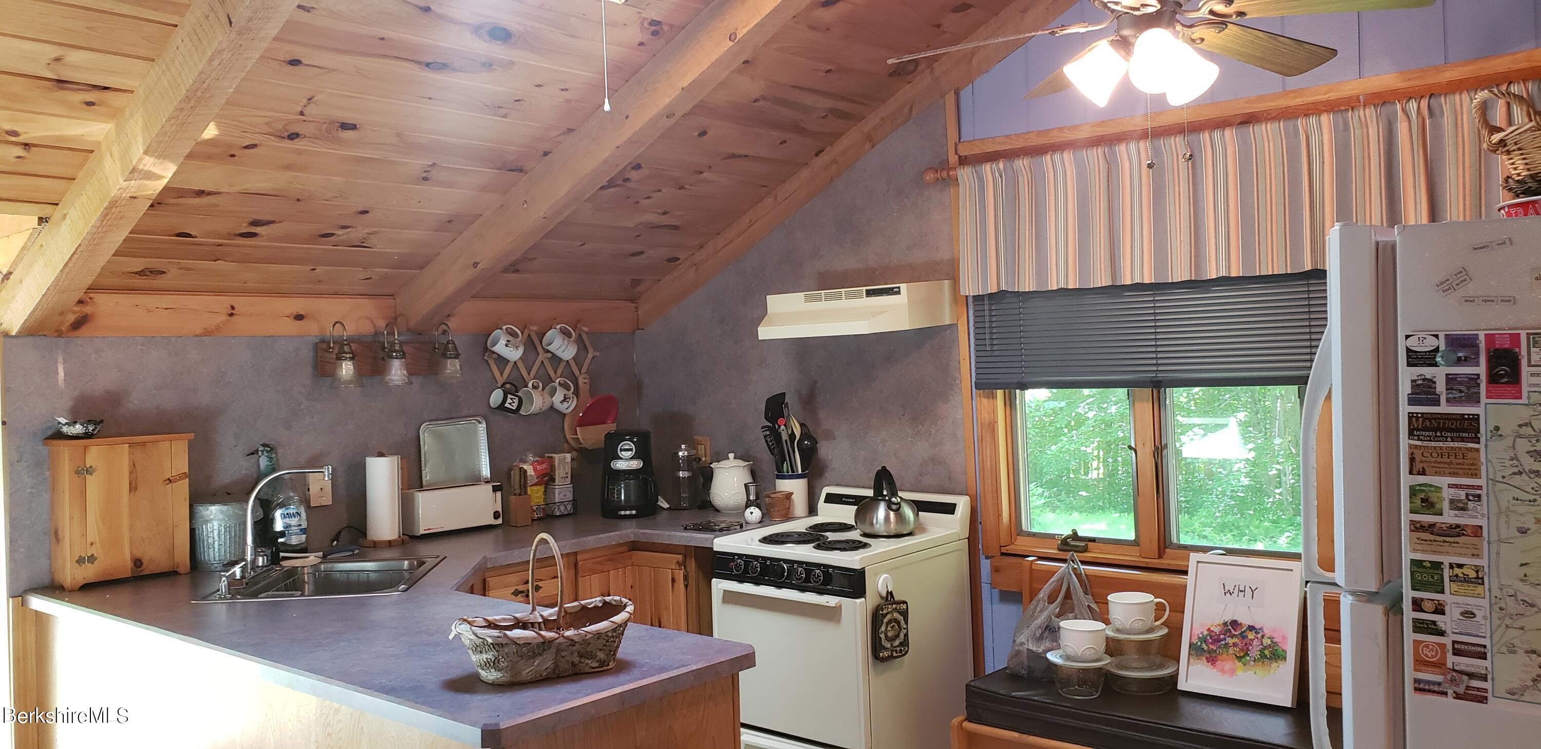 110 Strykers Road Florida, MA 01247 - Photo 8 of 20 a kitchen with stove and a sink