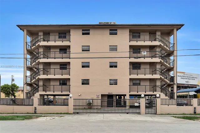 a large white building with a white roof