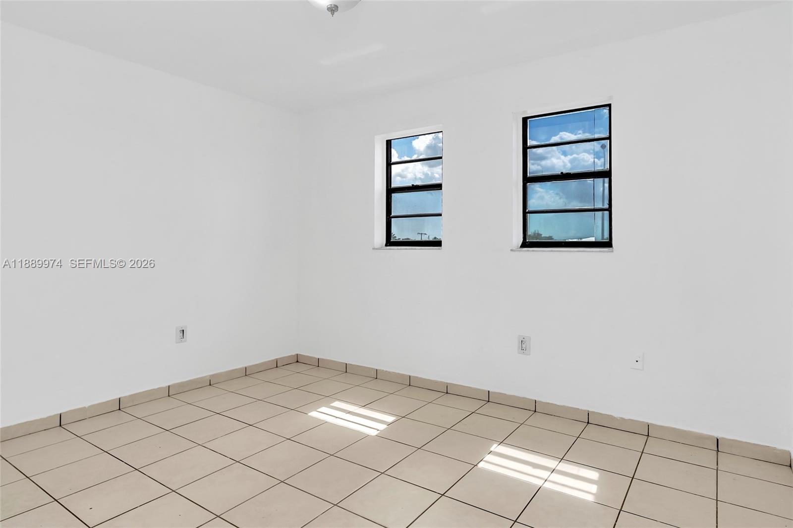 3945 Southwest 89th Avenue, Unit 201 Miami, FL 33165 - Photo 11 of 24 a view of room with window