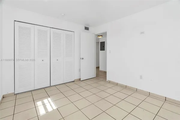 a view of an empty room and window