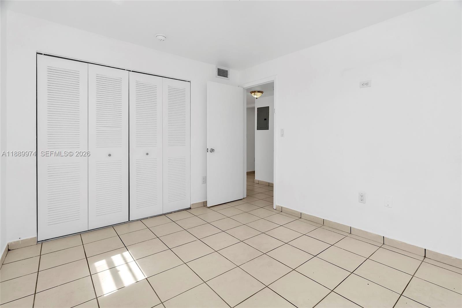 3945 Southwest 89th Avenue, Unit 201 Miami, FL 33165 - Photo 12 of 24 a view of a room with white walls
