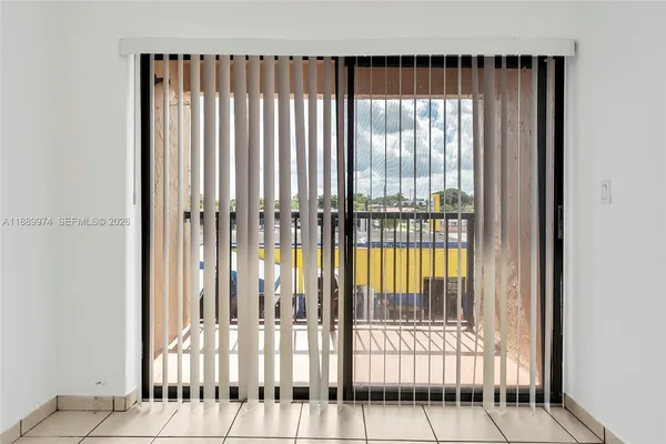 a kitchen with a sink and a refrigerator