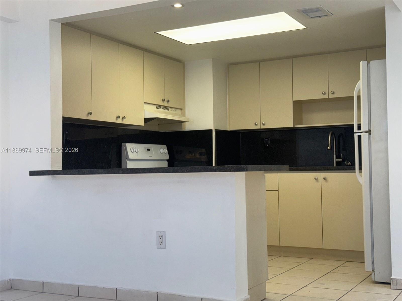 3945 Southwest 89th Avenue, Unit 201 Miami, FL 33165 - Photo 16 of 24 a view of cabinets
