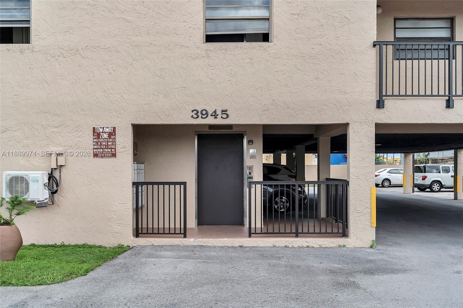 3945 Southwest 89th Avenue, Unit 201 Miami, FL 33165 - Photo 2 of 24 a view of a livingroom with a patio