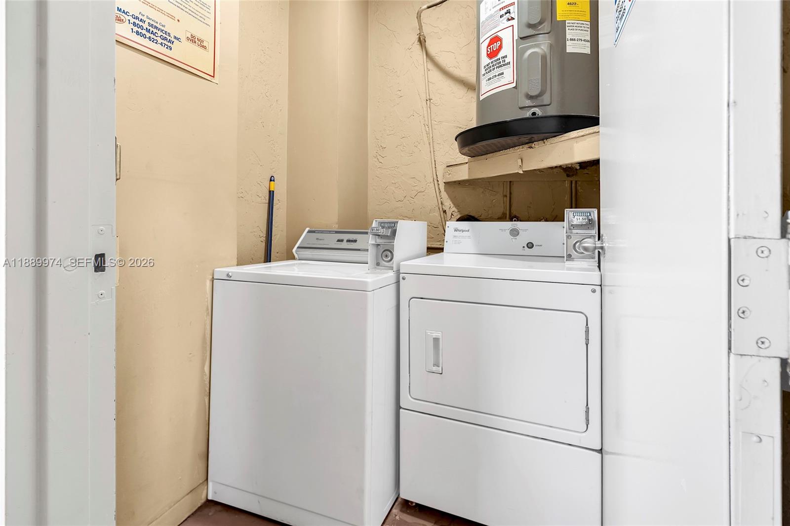 3945 Southwest 89th Avenue, Unit 201 Miami, FL 33165 - Photo 22 of 24 a utility room with dryer and washer