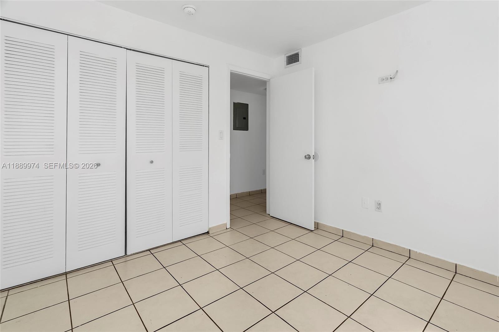 3945 Southwest 89th Avenue, Unit 201 Miami, FL 33165 - Photo 10 of 24 a view of an empty room
