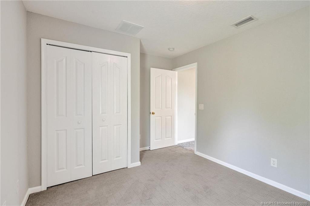 5902 Yucca Drive Fort Pierce, FL 34982 - Photo 25 of 83 a view of an empty room