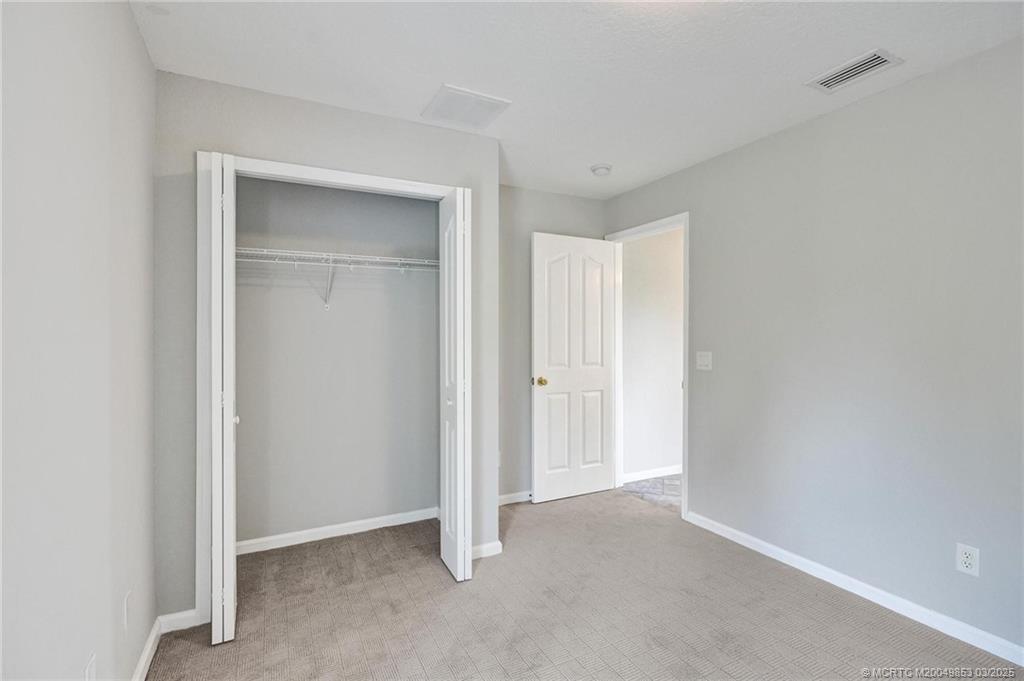 5902 Yucca Drive Fort Pierce, FL 34982 - Photo 27 of 83 a view of an empty room