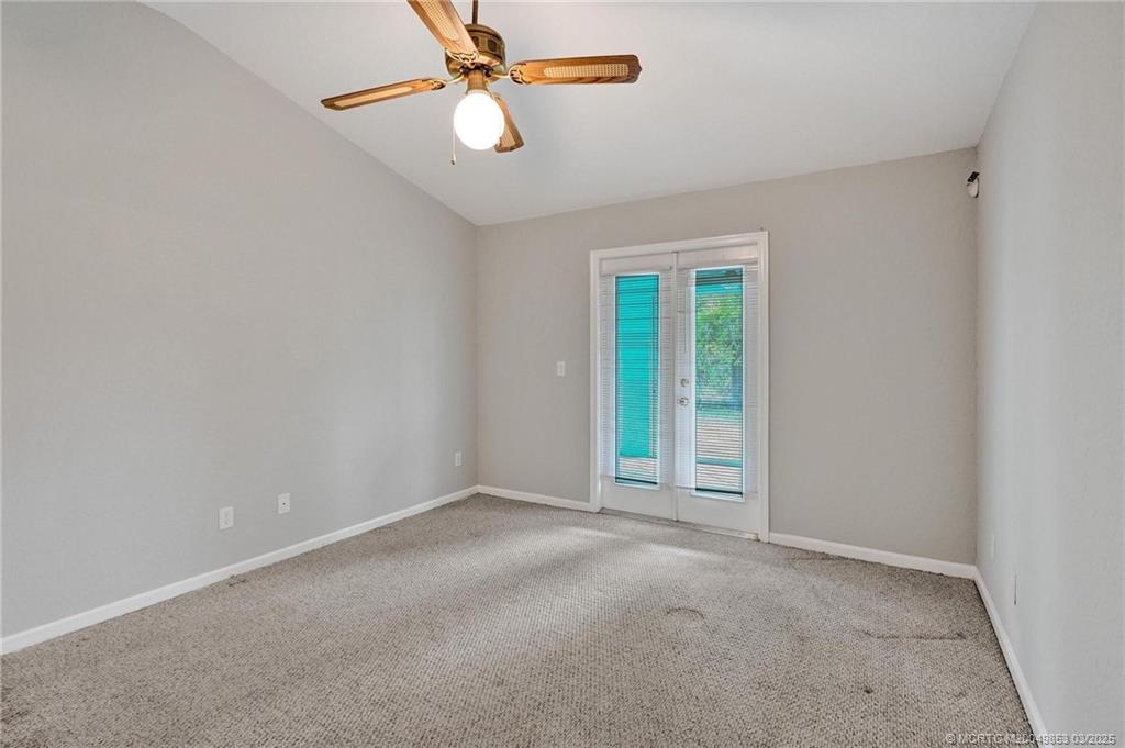 5902 Yucca Drive Fort Pierce, FL 34982 - Photo 31 of 83 an empty room with fan