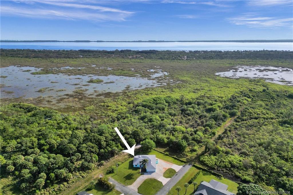 5902 Yucca Drive Fort Pierce, FL 34982 - Photo 48 of 83 a view of a lake from a yard
