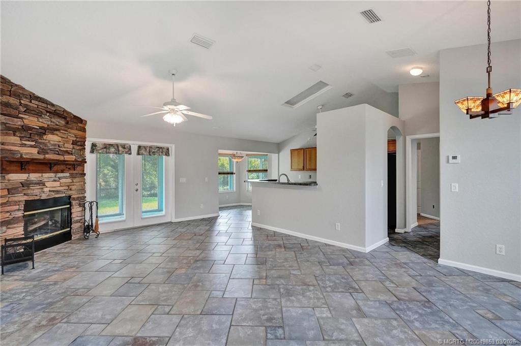 5902 Yucca Drive Fort Pierce, FL 34982 - Photo 6 of 83 a view of livingroom with furniture and flat screen tv