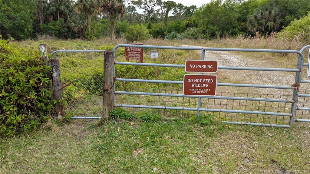 5902 Yucca Drive Fort Pierce, FL 34982 - Photo 72 of 83 a view of a wooden fence and a park