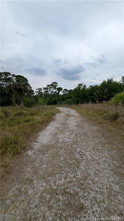 5902 Yucca Drive Fort Pierce, FL 34982 - Photo 76 of 83 a view of a lake with houses in the back