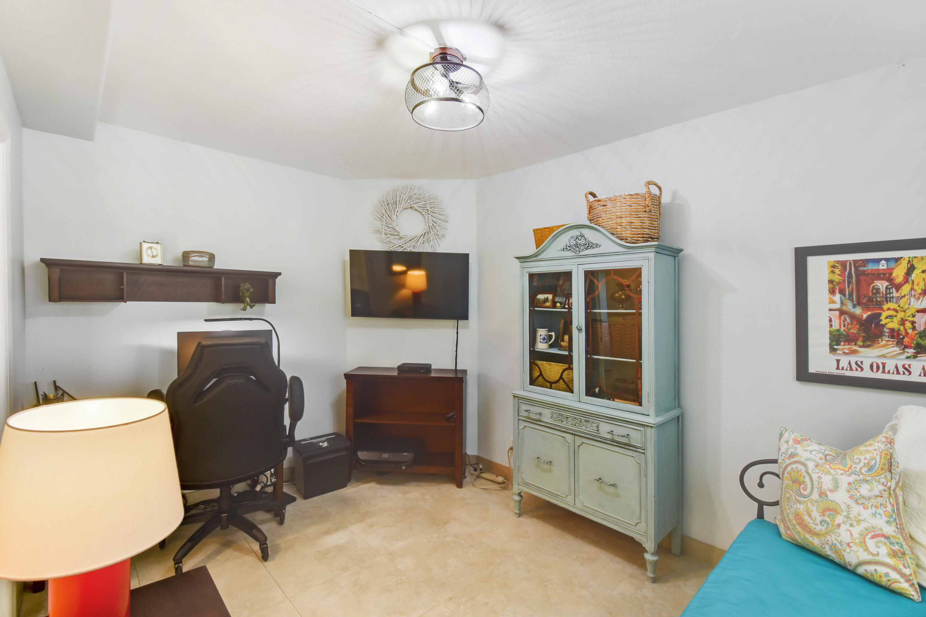 111 North Pompano Beach Boulevard, Unit 811 Pompano Beach, FL 33062 - Photo 13 of 24 a view of a workspace with furniture and a window