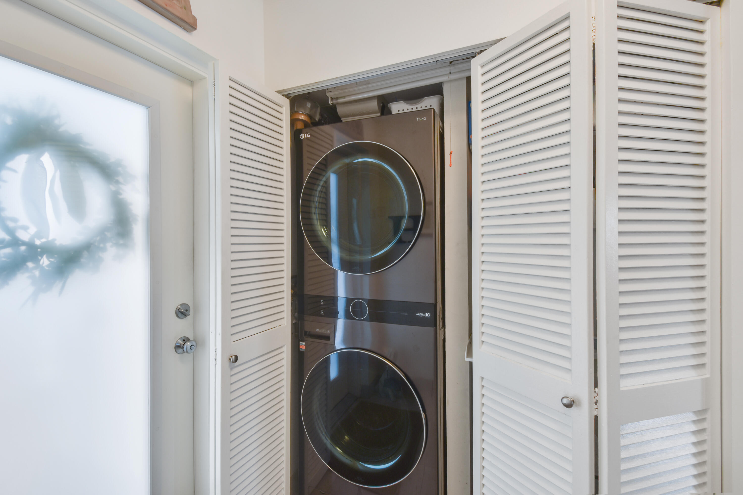 111 North Pompano Beach Boulevard, Unit 811 Pompano Beach, FL 33062 - Photo 20 of 24 a close view of a utility room with dryer and washer