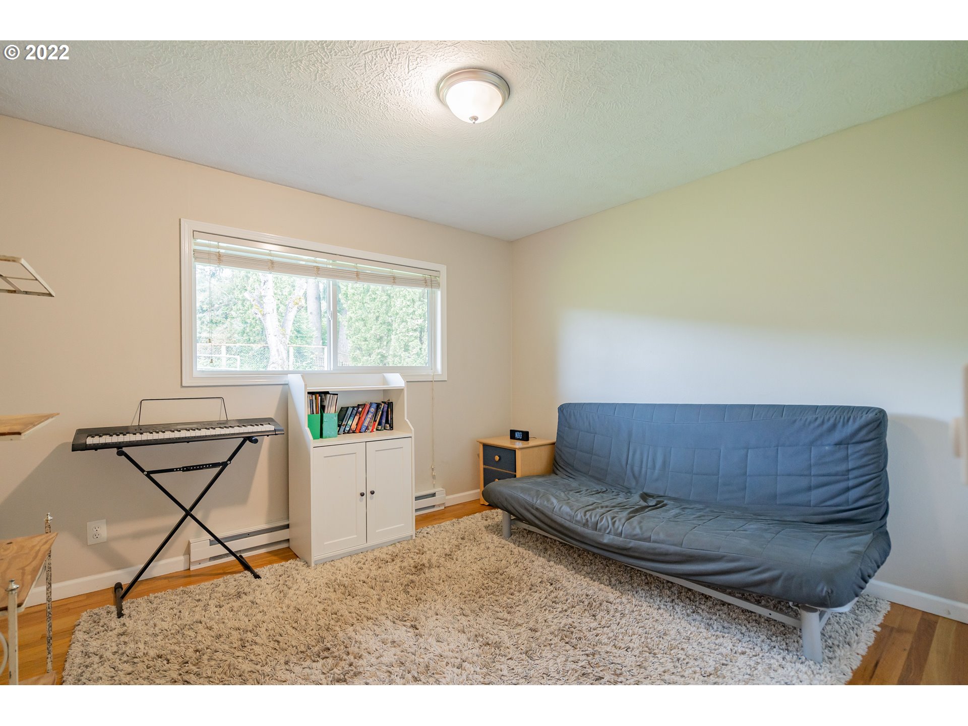 26415 Northeast Brunner Road Camas, WA 98607 - Photo 14 of 32 a living room with furniture and a window