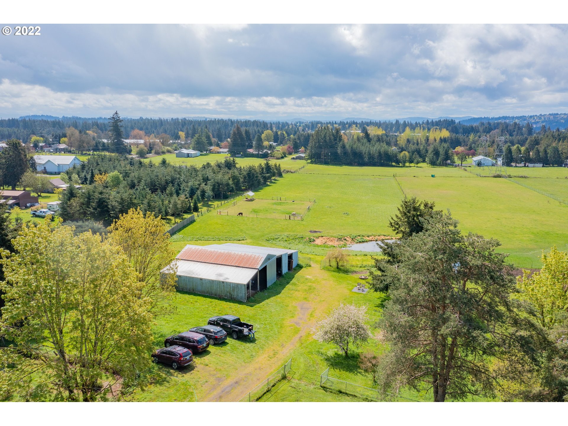 26415 Northeast Brunner Road Camas, WA 98607 - Photo 29 of 32 a view of a lake with houses in the back