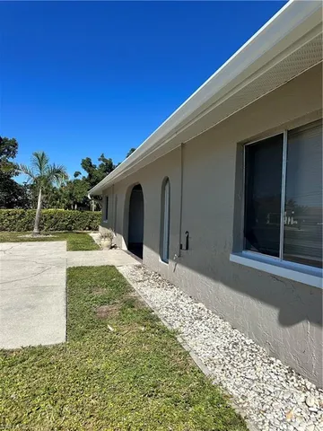 a view of a back yard of the house