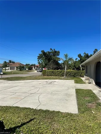 a view of a lake with a big yard